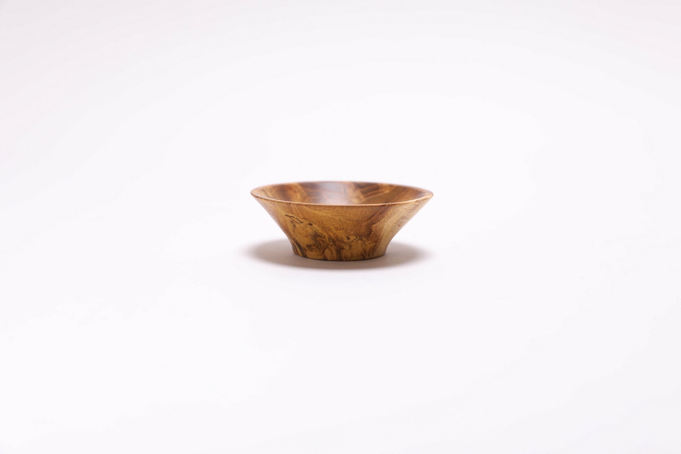 Tiny handmade mulberry burl bowl with natural oil finish, made in NC