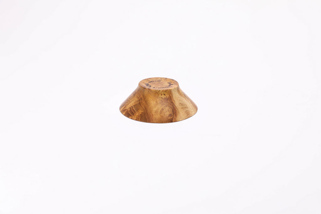 Mulberry burl wooden bowl showing base and turned foot detail