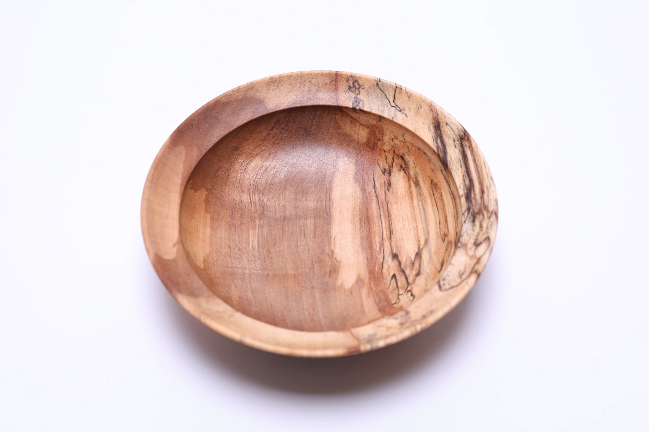 Spalted river birch wooden bowl, top view at 90°, natural spalting pattern and quilted figure in bronze area, made in NC