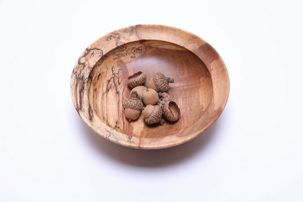 Spalted river birch wooden bowl, top view with acorns for scale, 6⅜" handcrafted bowl by Sanders Woodworking, made in NC