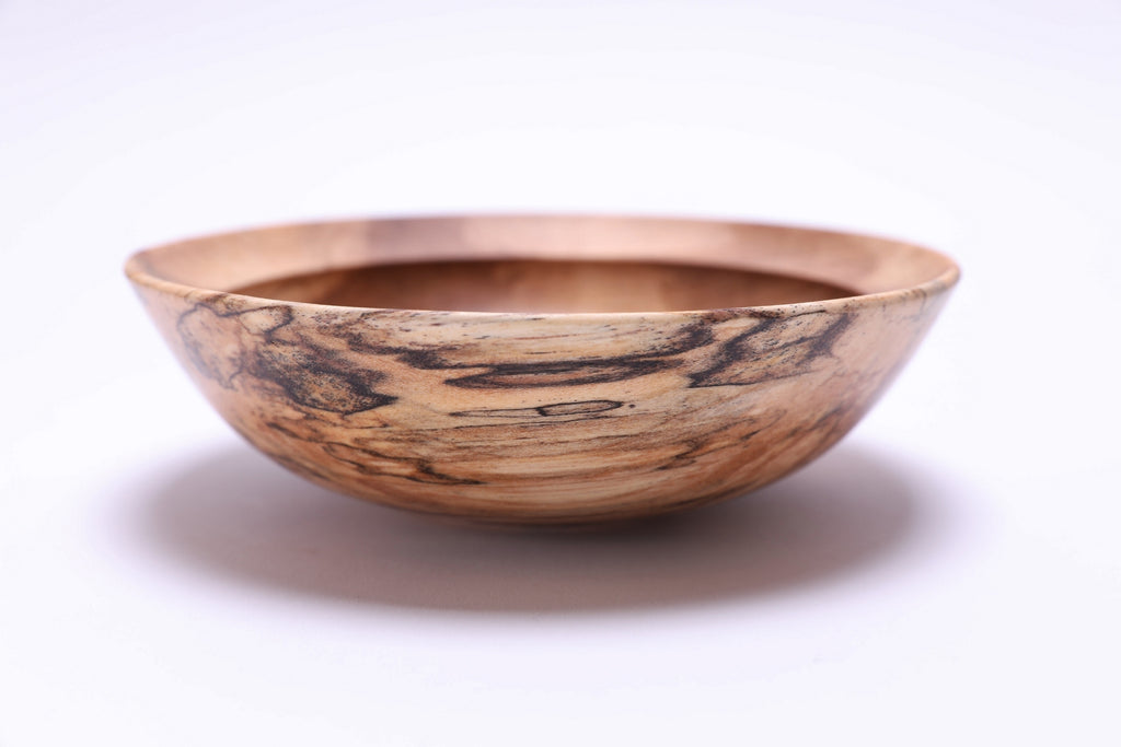 Spalted river birch wooden bowl, angled side view showcasing dramatic ink-black spalting transition lines, handcrafted by Sanders Woodworking