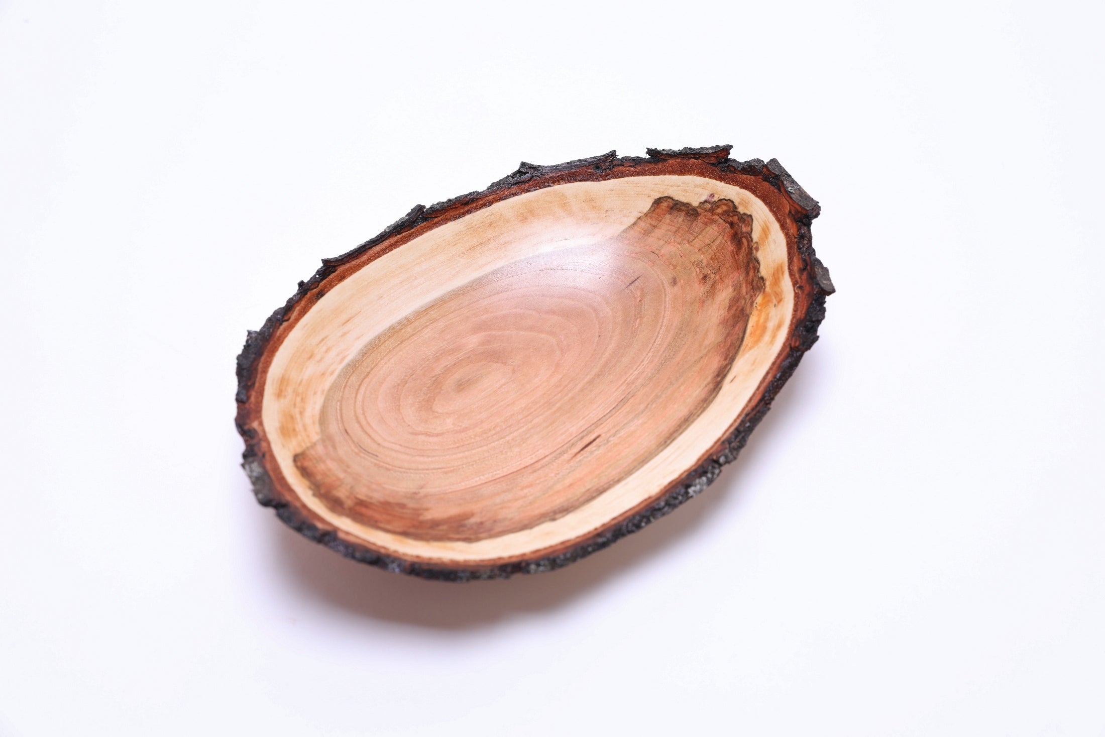 Natural edge wild black cherry bowl, top view showing sapwood band and figured heartwood center, handmade in NC
