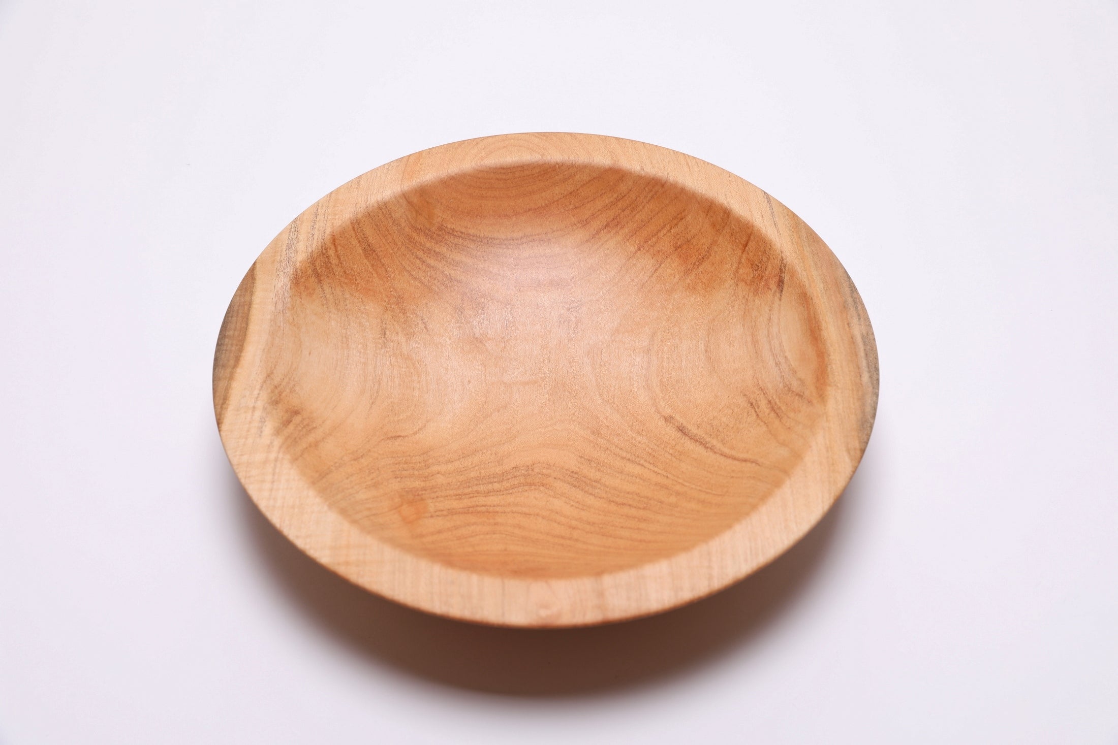 Top view of sugar maple chopping bowl rotated 90 degrees, dense hardwood grain detail
