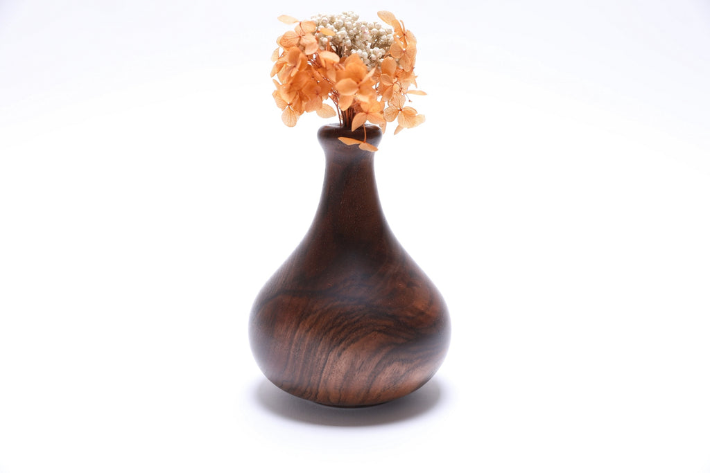 Claro walnut burl weed pot with dried flowers, side view rotated 180 degrees, food-safe oil finish