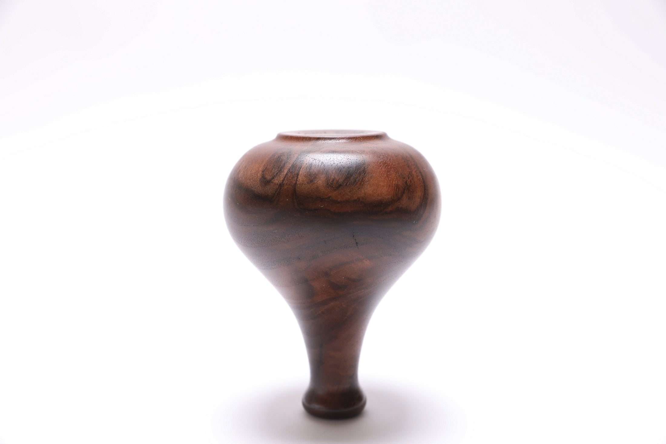 Bottom view of claro walnut burl weed pot showing turned foot, Sanders Woodworking, made in NC