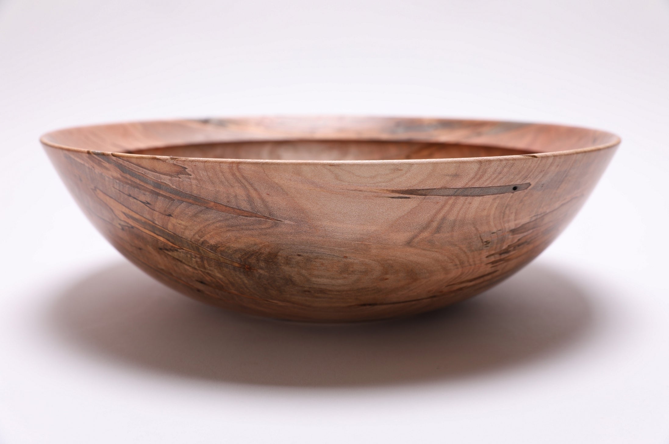 Ambrosia maple salad bowl, side view rotated 90 degrees, natural ambrosia streaks and figure