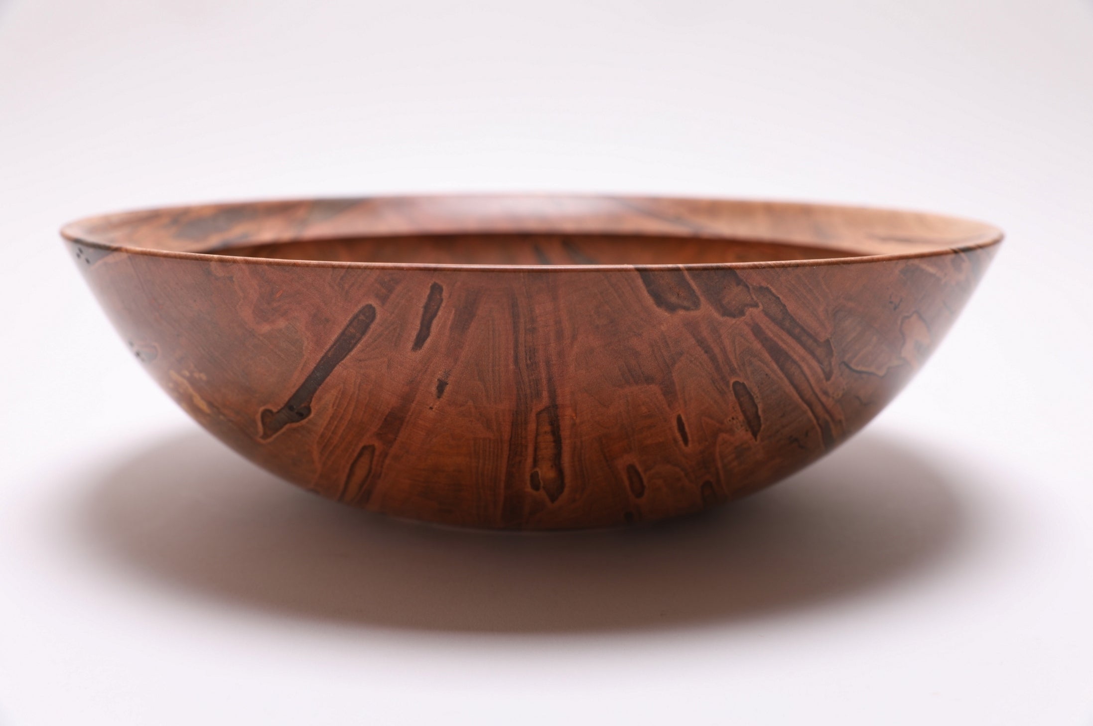 Ambrosia maple salad bowl, side view rotated 180 degrees, food-safe oil finish, handmade in NC
