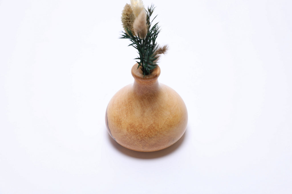 Spalted big leaf maple weed pot with dry flowers, angled side view rotated 90 degrees, natural spalted figure