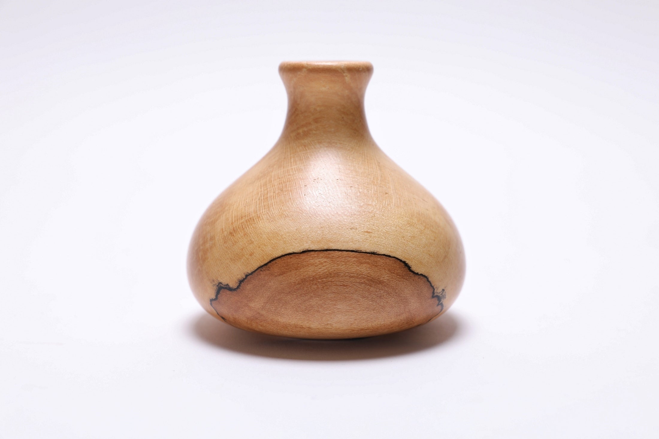 Spalted big leaf maple weed pot Spot, side view, 4 x 3 5/8 inches, striking amber dot detail, Sanders Woodworking