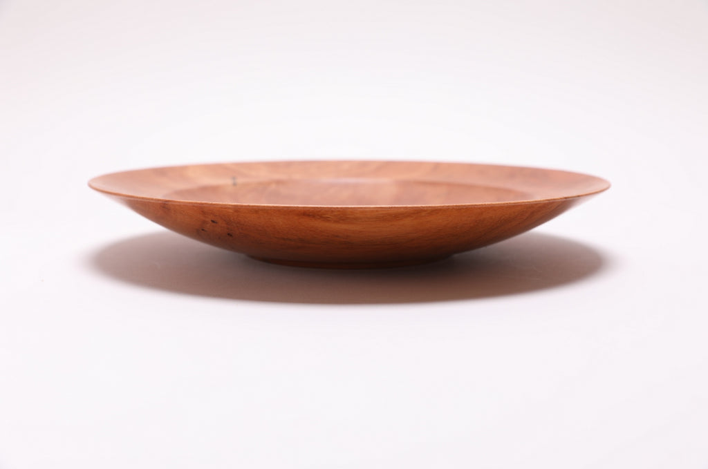 Handcrafted wild black cherry bowl, side view rotated 270 degrees, raised foot detail, Sanders Woodworking