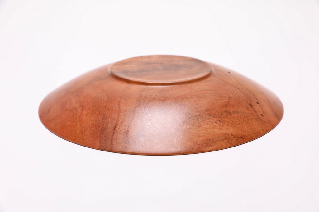Wild black cherry shallow bowl #2789, bottom view showing raised foot and natural oil finish, made in USA