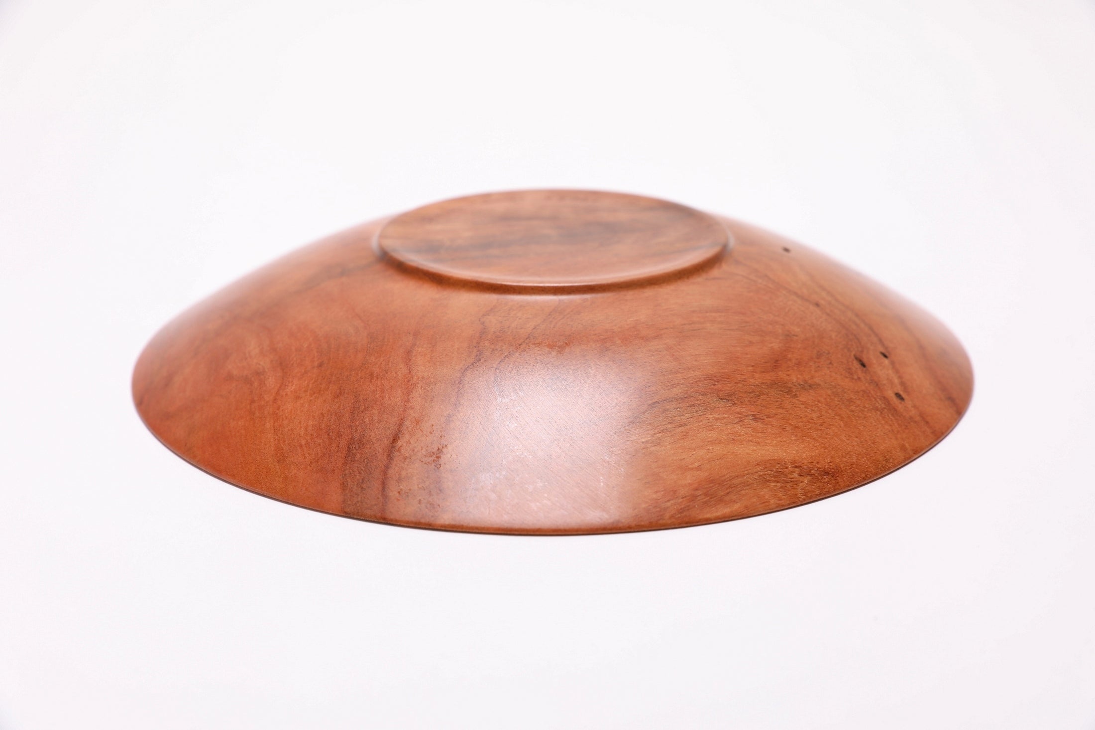 Wild black cherry shallow bowl #2789, bottom view showing raised foot and natural oil finish, made in USA