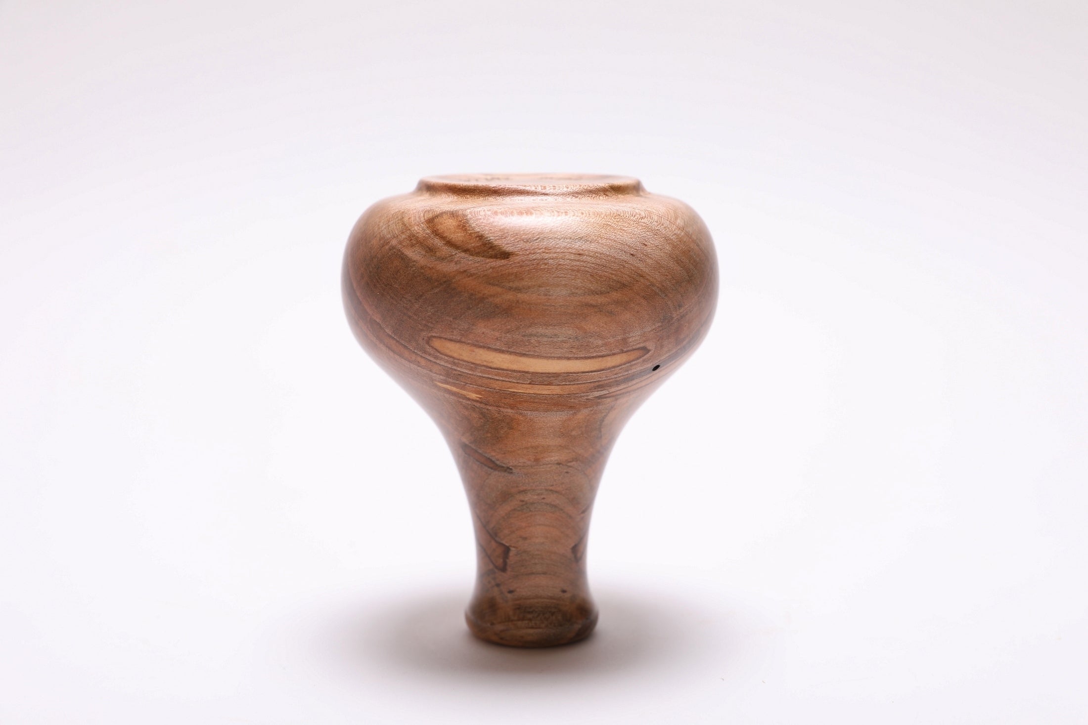 Ambrosia maple weed pot bottom view, two beetle holes visible, food-safe oil finish