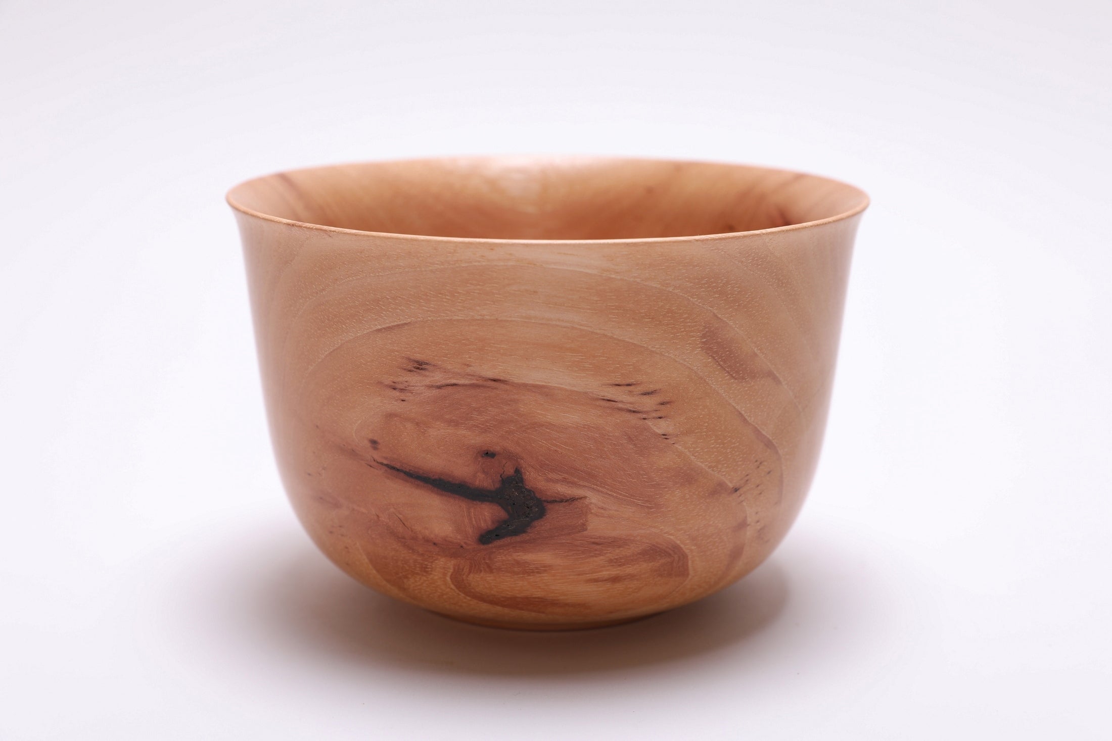 Pecan Liberty Bell bowl side view showing bell rim and bark inclusions, handcrafted by Sanders Woodworking