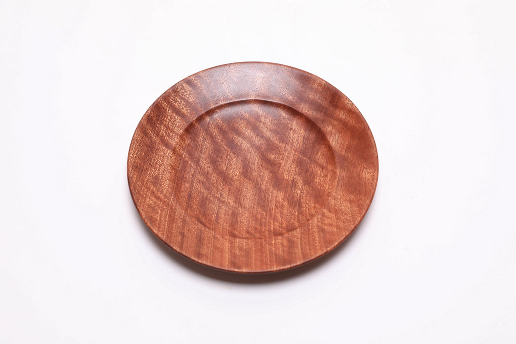 Small sapele ring dish, top view rotated 30°, natural oil finish with quilted figure detail
