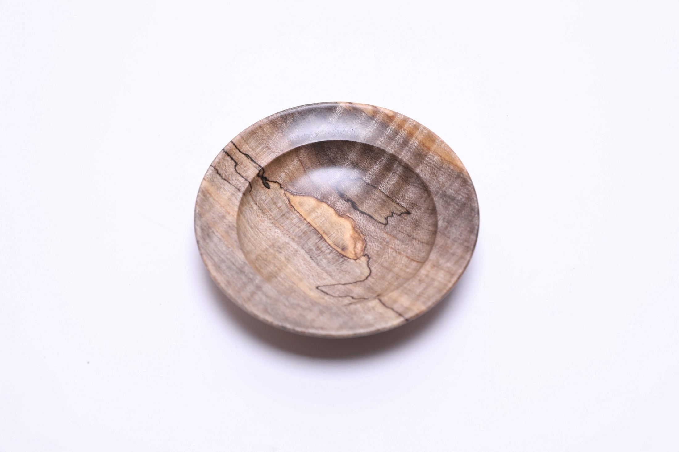 Spalted tiger maple ring dish, top view rotated 45°, tiger figure and spalting detail