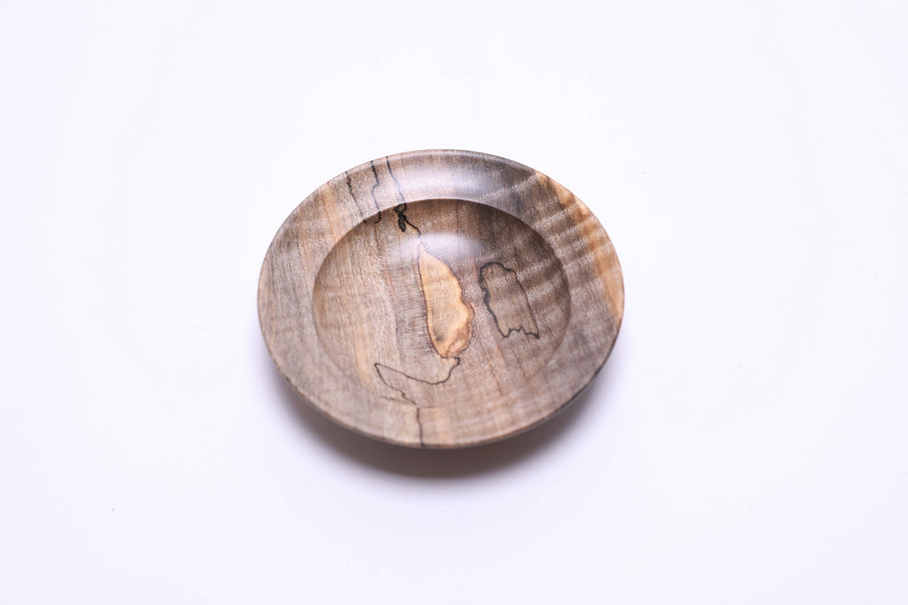 Small spalted maple ring dish, top view rotated 90°, gray and tan coloration with spalting lines