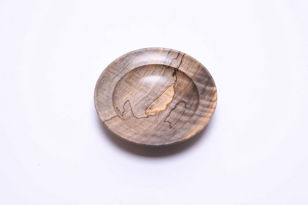 Spalted tiger maple ring dish, top view rotated 135°, amber and gray tones, food-safe oil finish