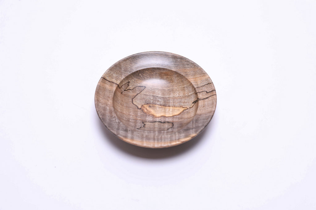 Spalted tiger maple ring dish, top view rotated 225°, warm amber and gray spalting pattern