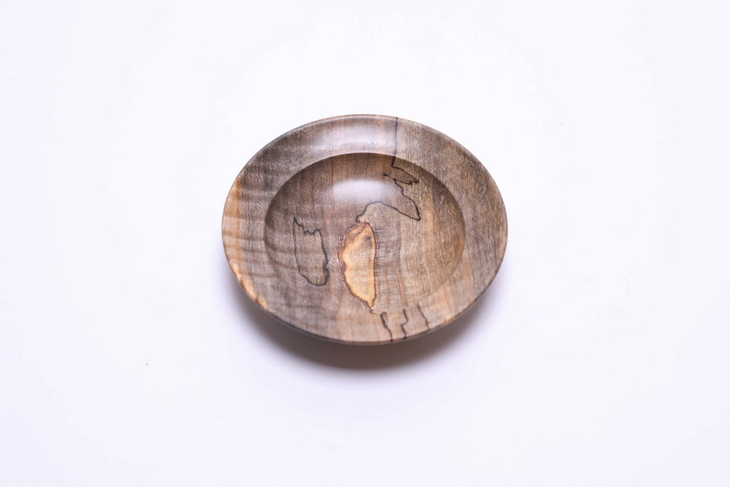 Spalted tiger maple ring dish, top view rotated 315°, gray-to-tan transition lines and tiger figure