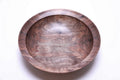 Handcrafted curly wild black walnut wooden bowl top view — rich chocolate brown and copper tones with dramatic curly figure, bud scars with halos, and food-safe oil finish, made in NC by Sanders Woodworking