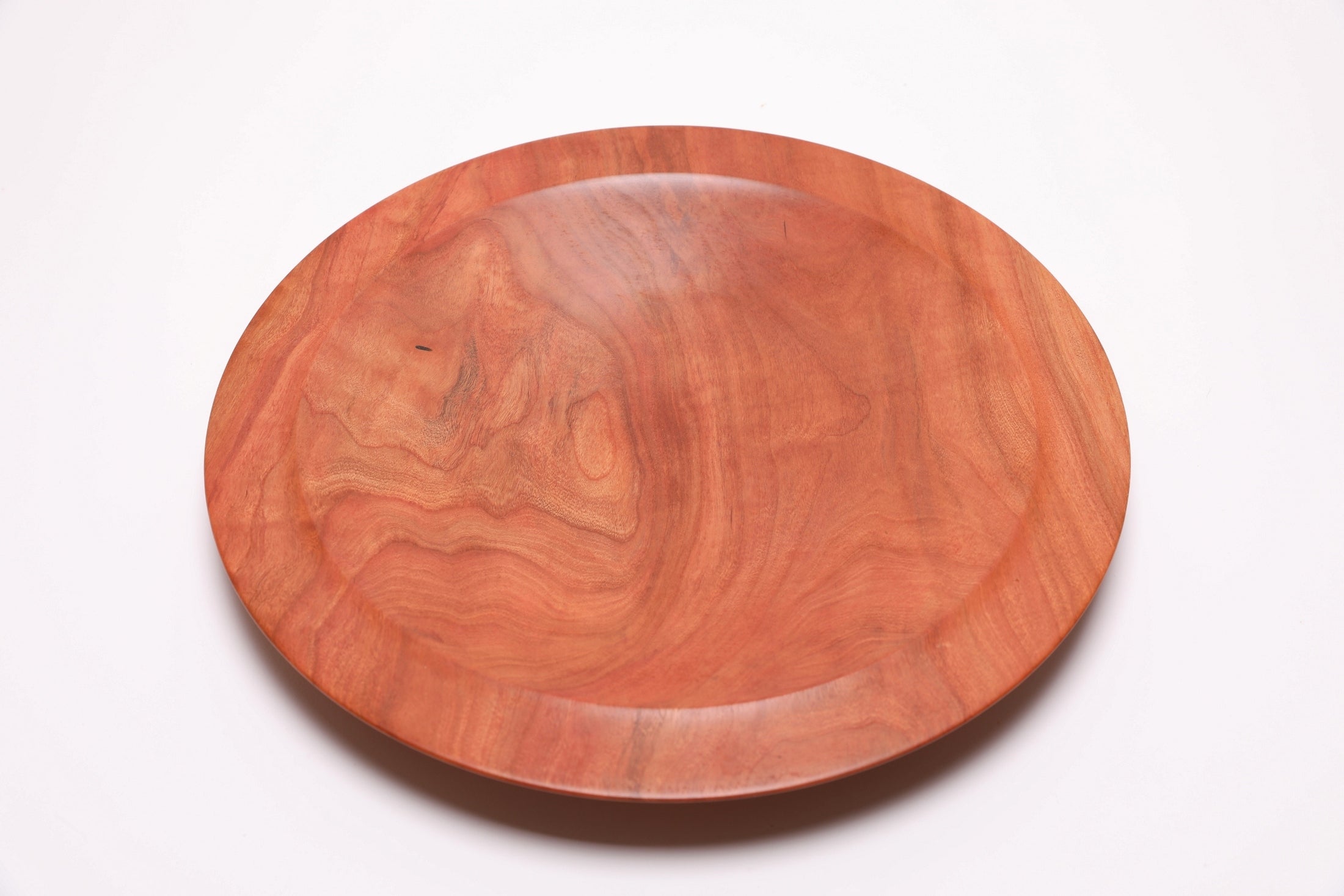 Wild black cherry wooden platter — top view, 90°, highlighting rich warm grain and filled worm hole