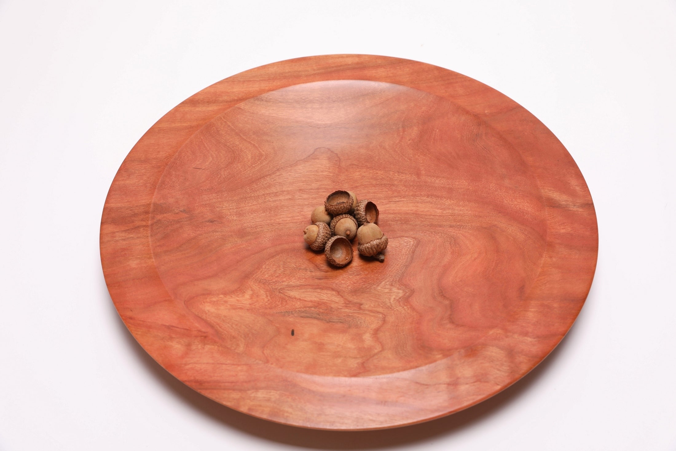 Wild black cherry wooden platter with acorns for scale — 14.5" handcrafted serving platter, made in NC