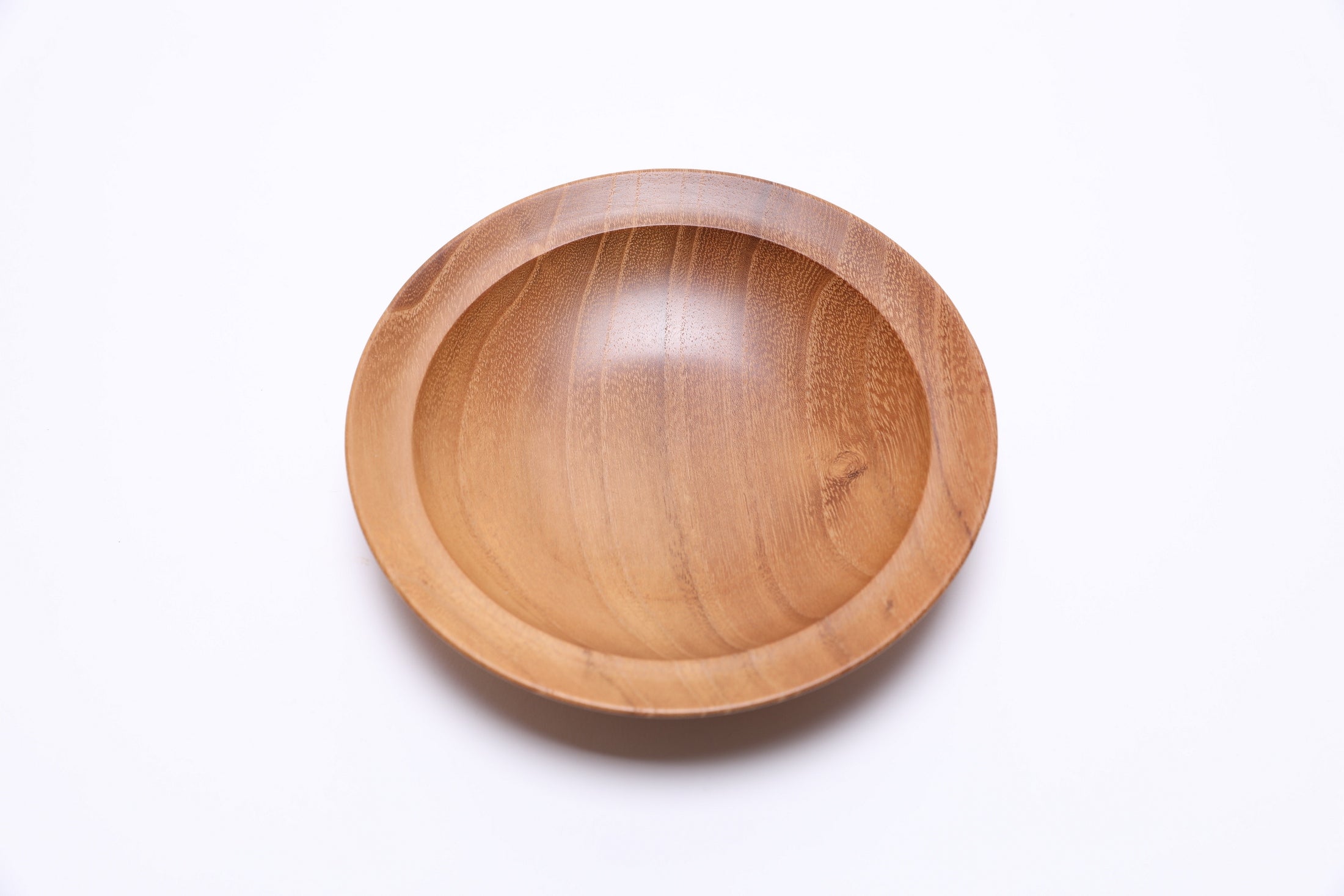 Small black locust wooden bowl top view rotated 270 degrees showing natural figure