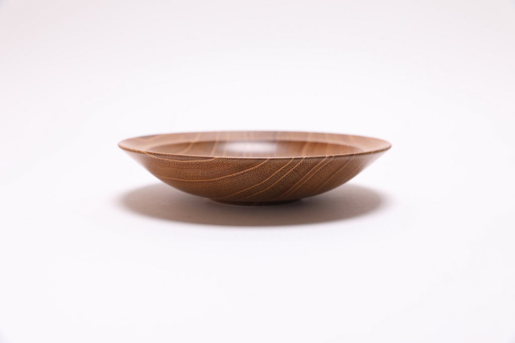 Small black locust wooden bowl side view rotated 270 degrees showing iridescent wood