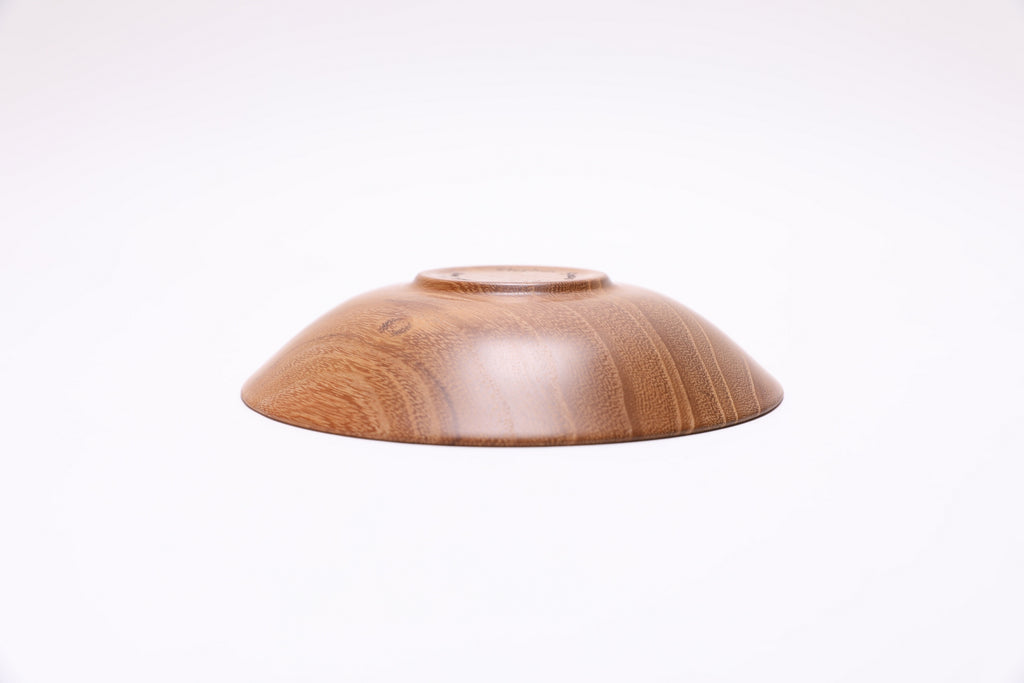 Small black locust wooden bowl bottom view showing foot and natural wood character