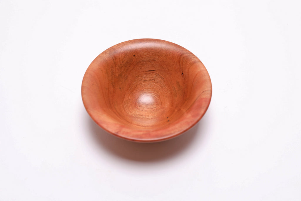 Small wild black cherry wooden bowl top view rotated 180 degrees showing iridescent cherry grain
