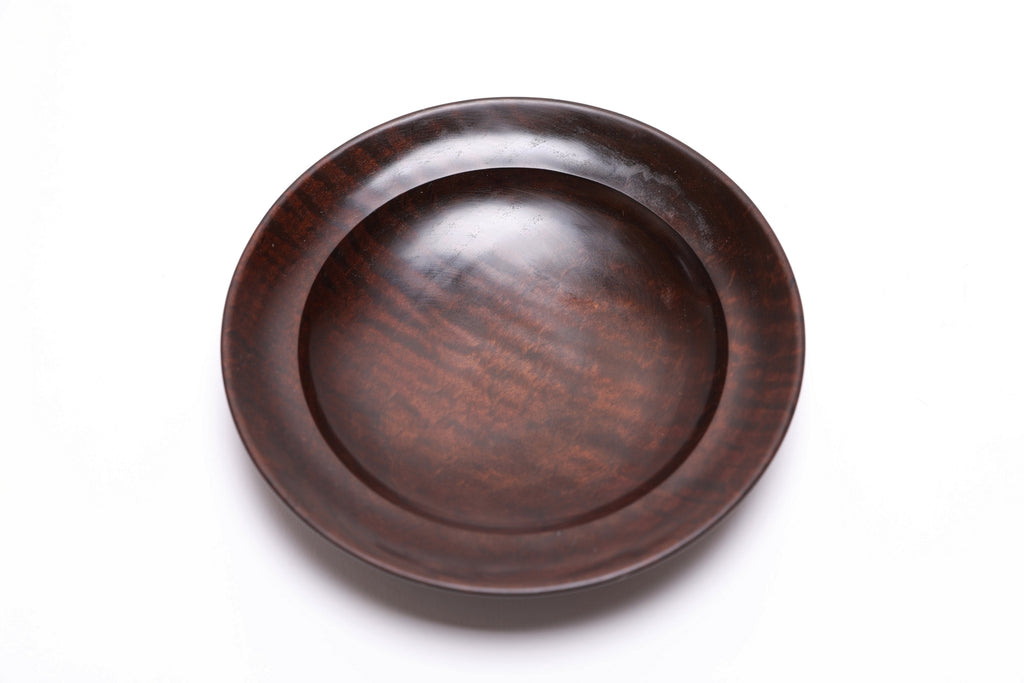 Thermally modified tiger maple wooden bowl top view rotated showing dramatic tiger stripe figure