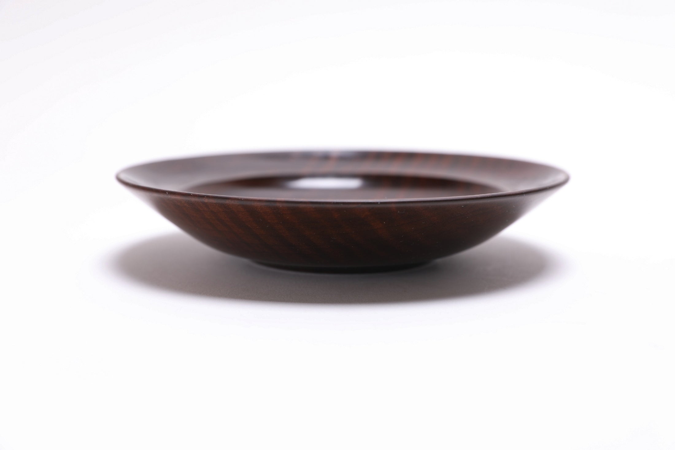 Thermally modified tiger maple wooden bowl side view showing 1 1/8 inch depth, handmade in NC