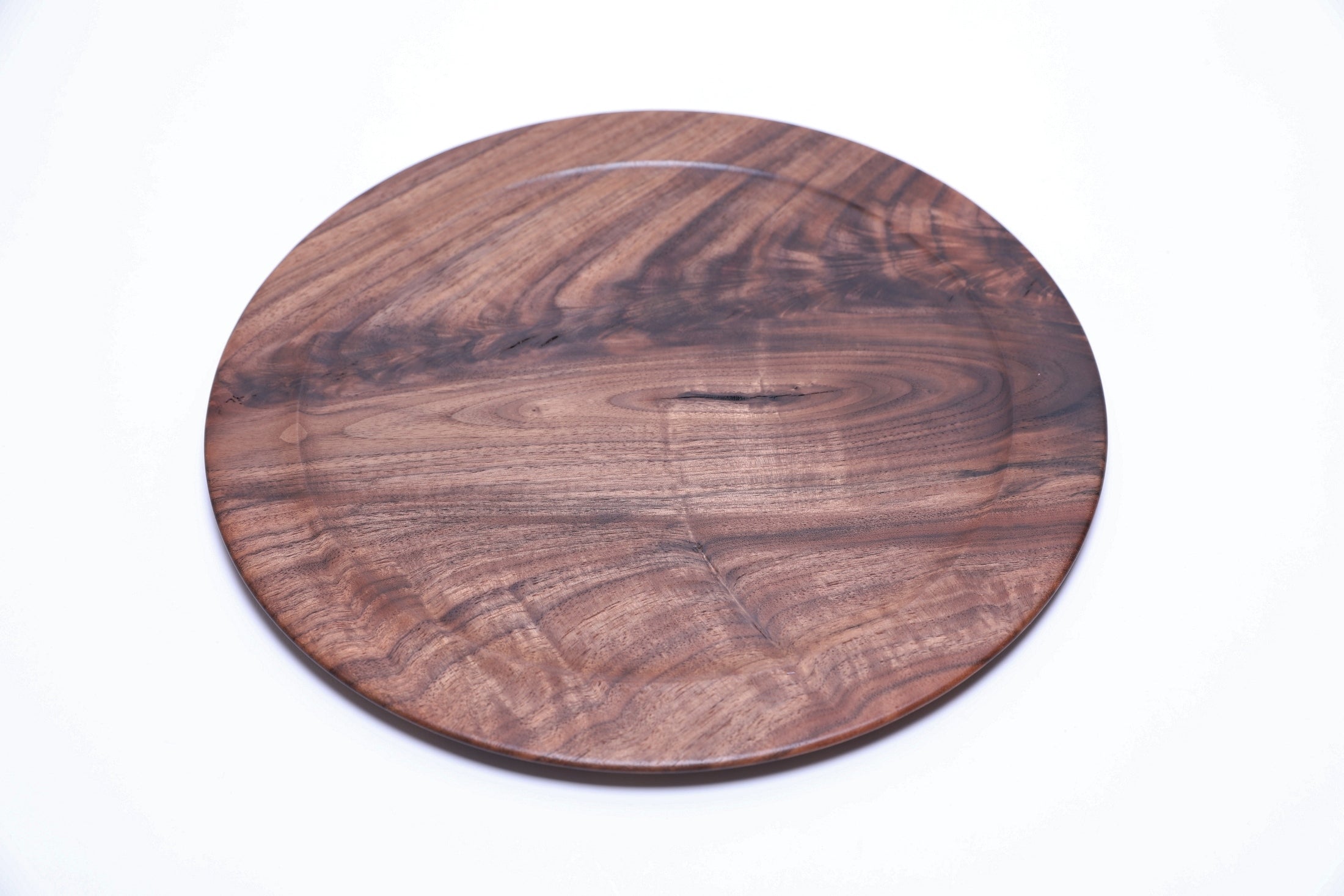 Handcrafted black walnut crotch burl platter, top view rotated 45°, featuring spalted wood detail
