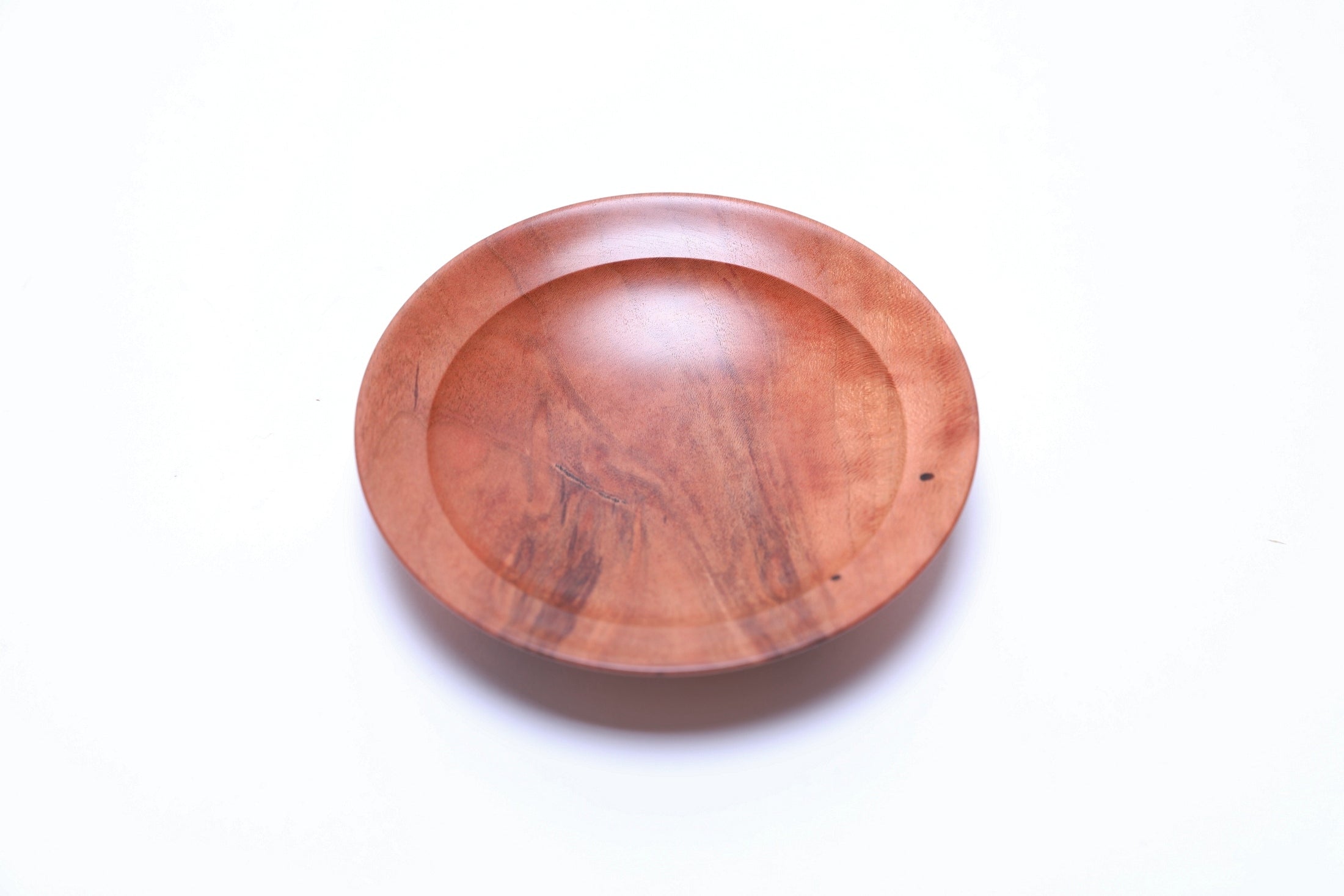 Wild black cherry wooden ring dish, top view at 270°, glass-like polished surface and undercut rim