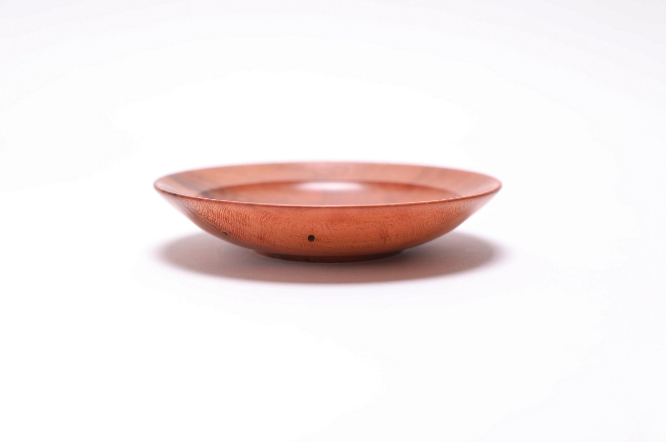 Wild black cherry wooden ring dish, side view at 90°, 1" depth and handcrafted rim detail