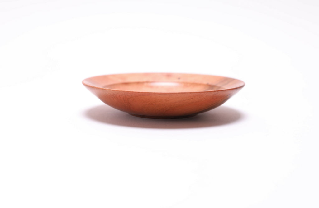 Wild black cherry wooden ring dish, side view at 270°, rich cherry color and turned profile