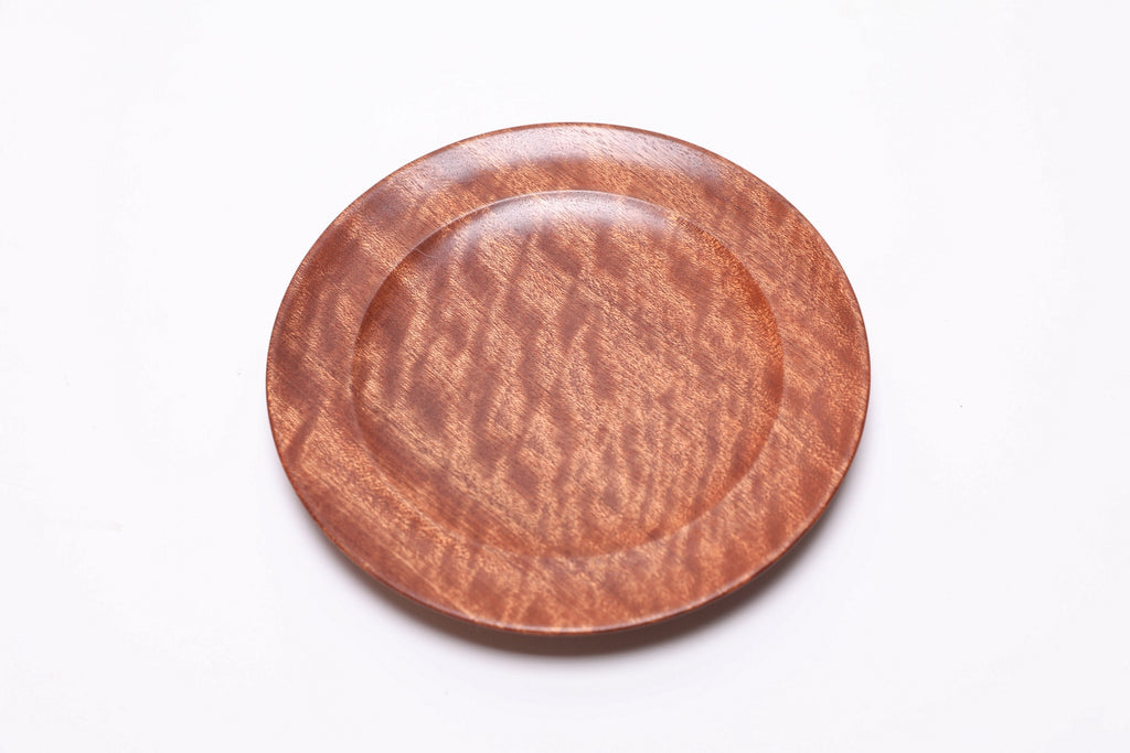 Pommele ribbon sapele wooden ring dish, top view showing chatoyant figure and ribbon grain
