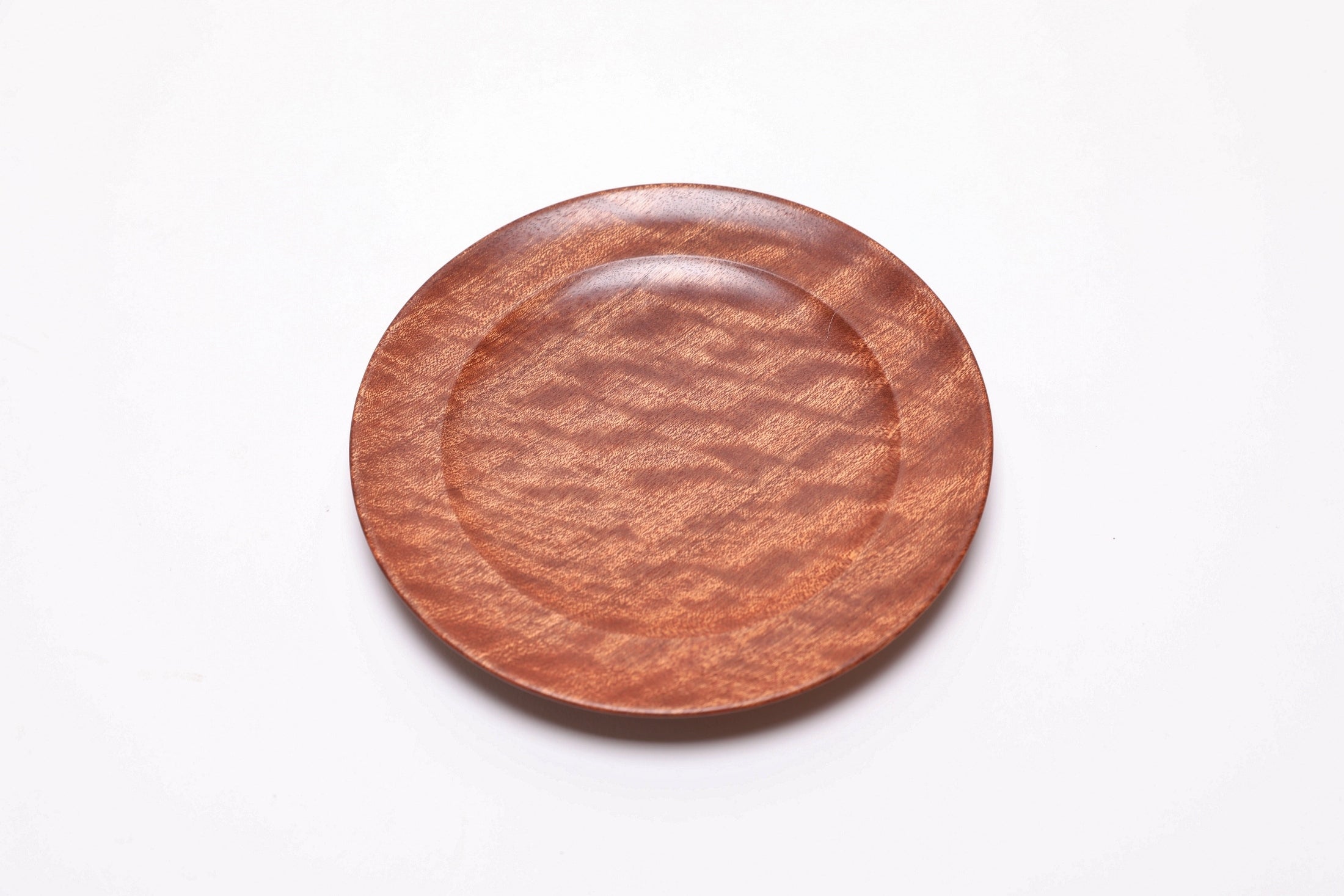 Pommele ribbon sapele wooden ring dish, top view rotated 45°, rich figure and food-safe oil finish