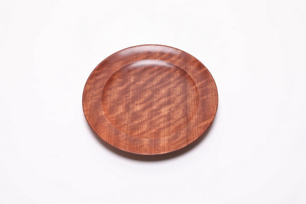 Pommele ribbon sapele wooden ring dish, top view rotated 45°, full figured surface and natural wood character