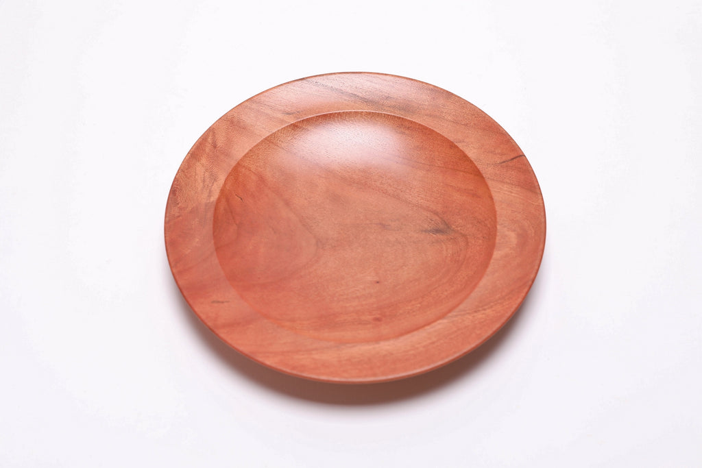 Wild black cherry wooden ring dish, top view at 90°, highlighting gray and brown markings and curved rim