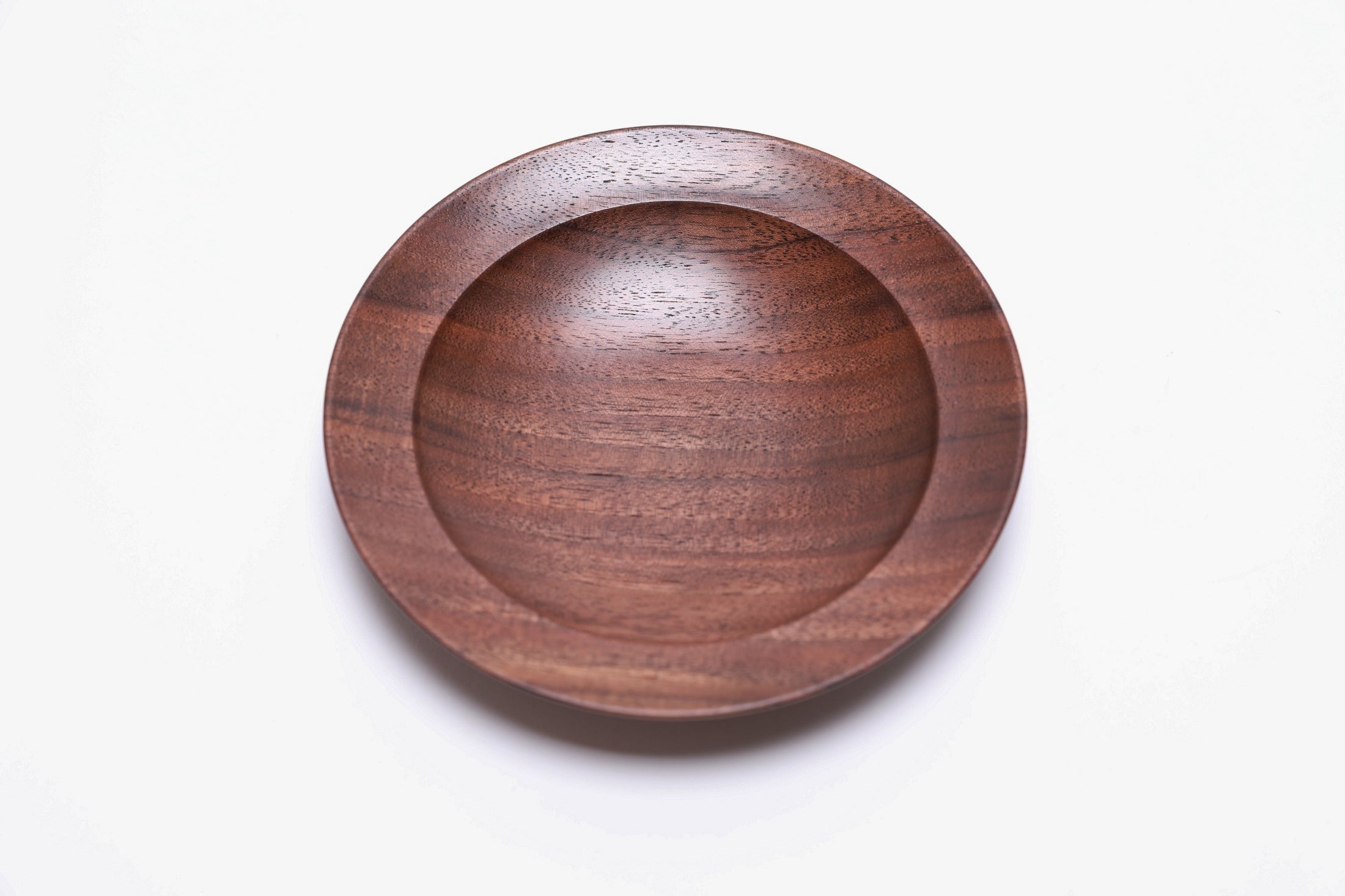  Quartersawn wild black walnut wooden ring dish, top view at 180°, rich quartersawn grain and undercut rim detail