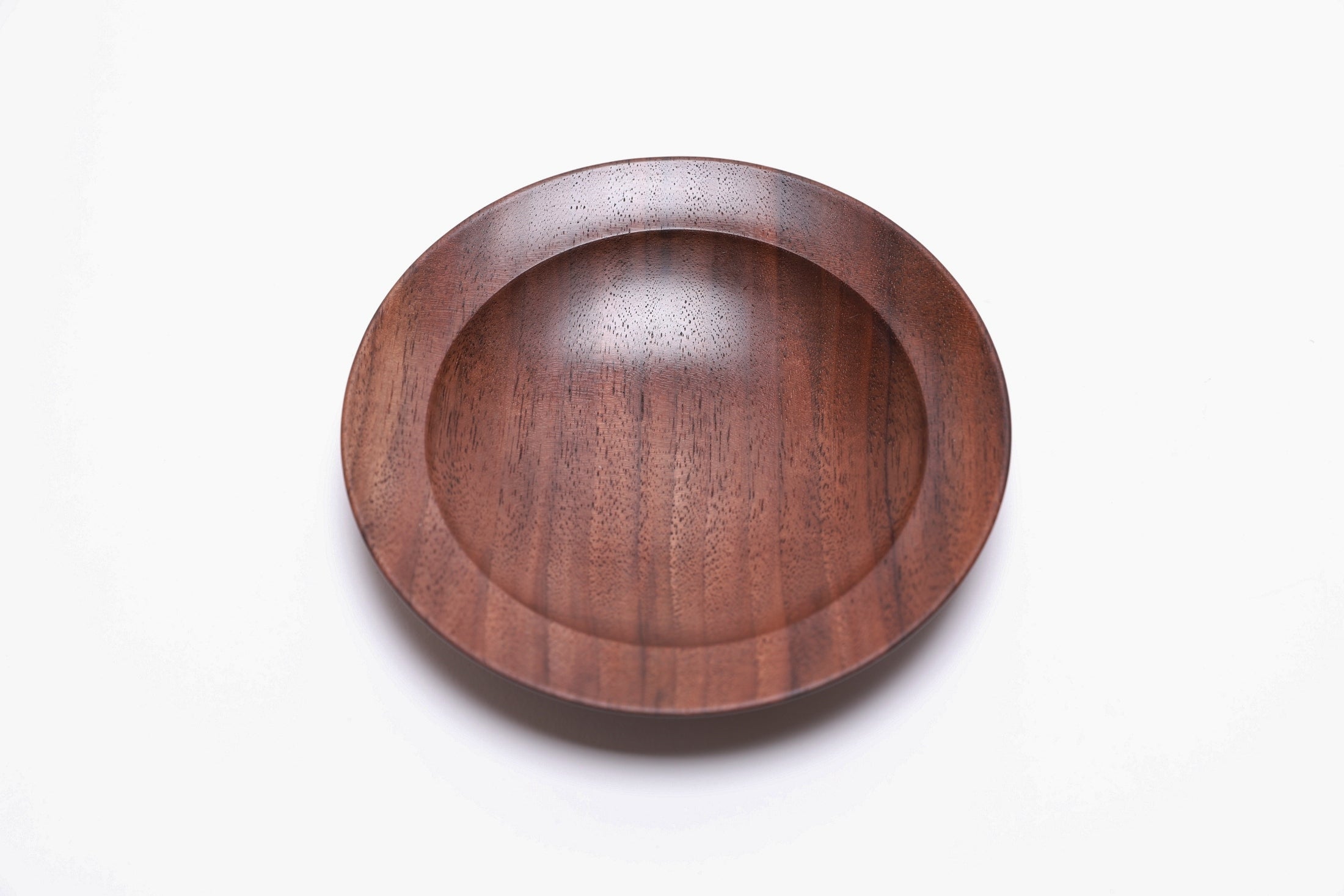 Quartersawn wild black walnut wooden ring dish, top view at 270°, contrasting grain lines and natural oil finish