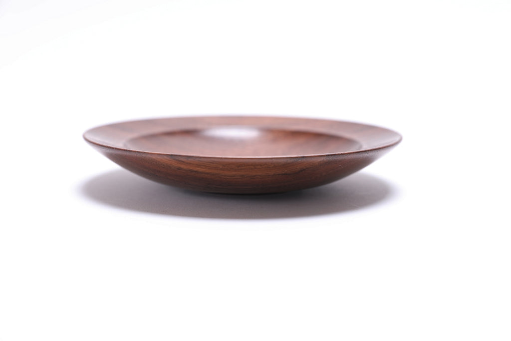 Quartersawn wild black walnut wooden ring dish, side view at 270°, raised foot and rich walnut color visible