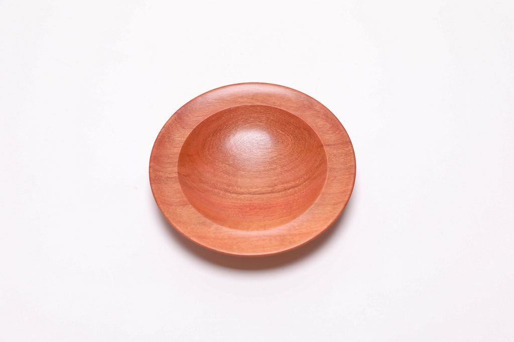 Wild black cherry wooden ring dish, top view at 0°, showing bullseye figure and red highlights