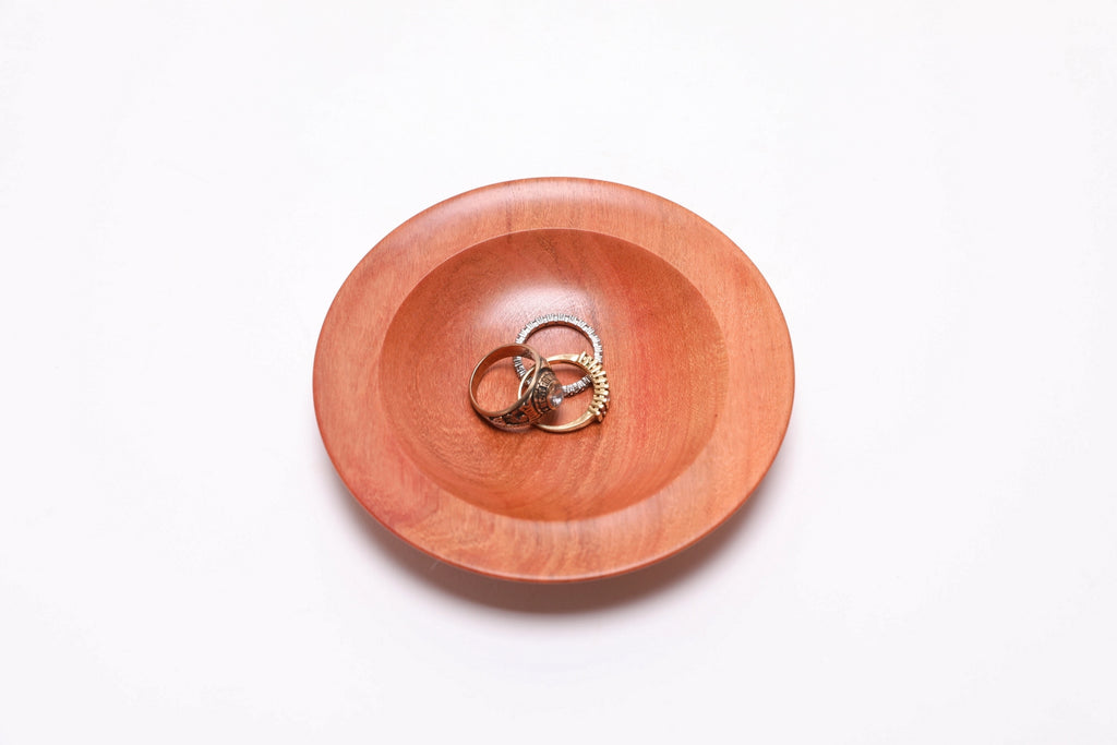 Wild black cherry wooden ring dish, top view with three rings for scale — rings not included