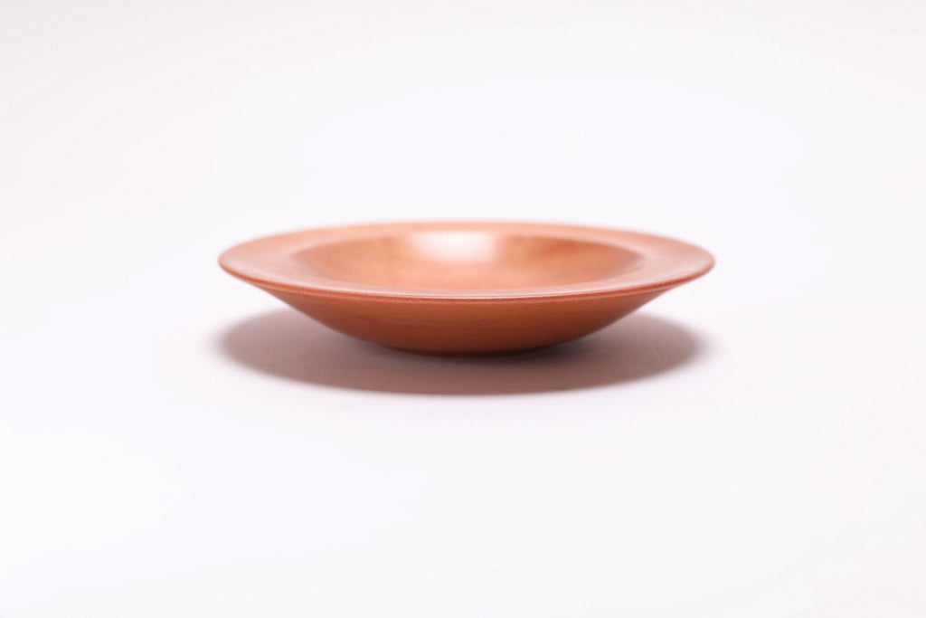 Wild black cherry wooden ring dish, side view at 0°, showing ¾" depth, curved taper, and raised foot