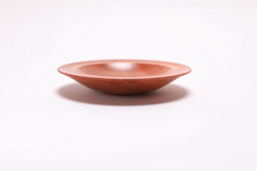 Wild black cherry wooden ring dish, side view at 90°, rounded rim and handcrafted profile