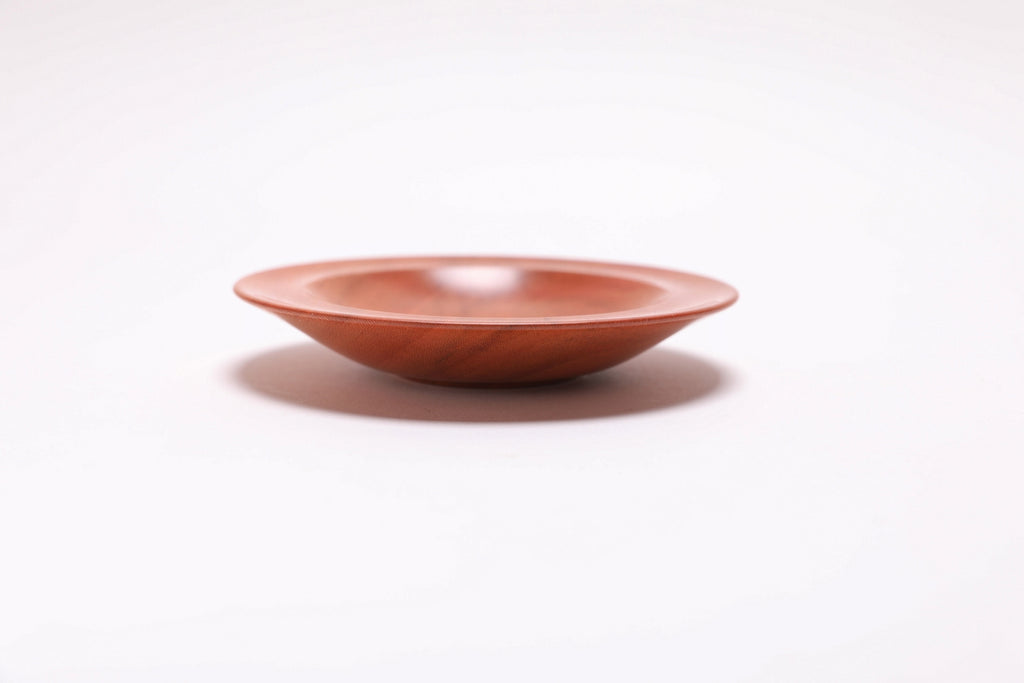 Wild black cherry wooden ring dish, side view at 270°, raised foot and rich cherry color visible