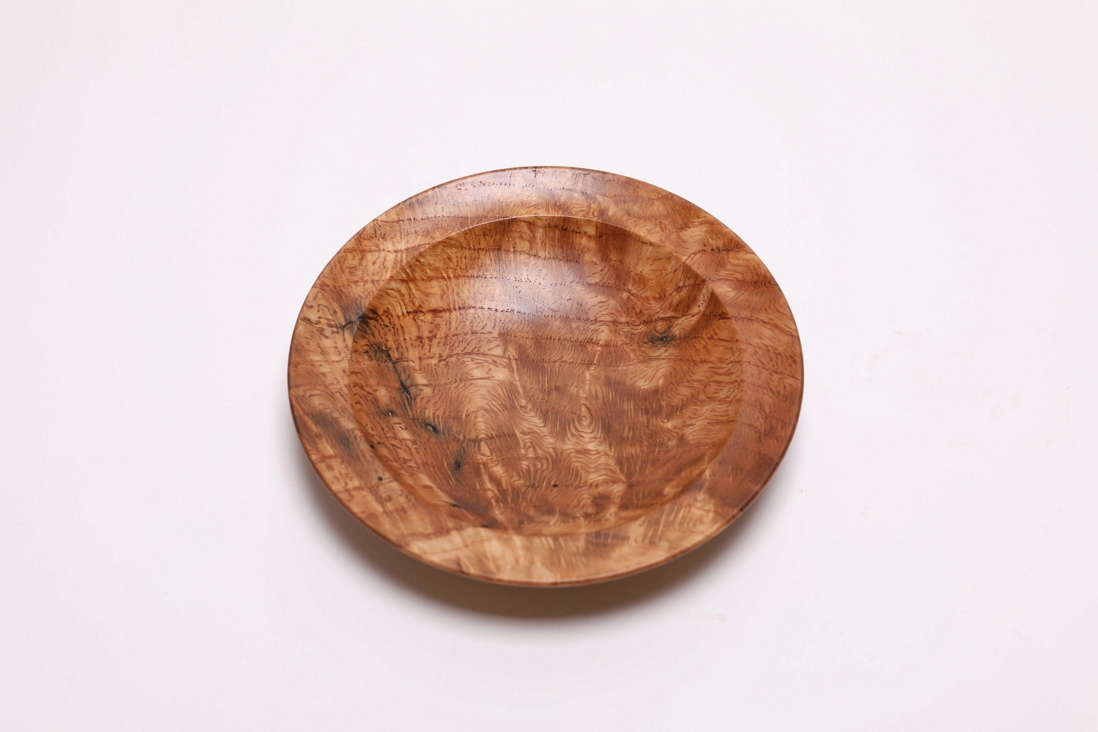 Wormy white oak crotch burl wooden bowl, top view at 0°, showing marble-like figure and worm hole character